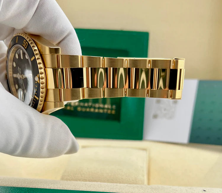 Rolex Submariner gold and black