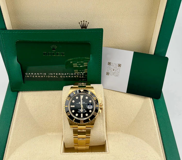 Rolex Submariner gold and black
